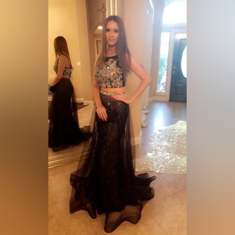Custom made.Only worn once. This dress was handmade by professional designer.